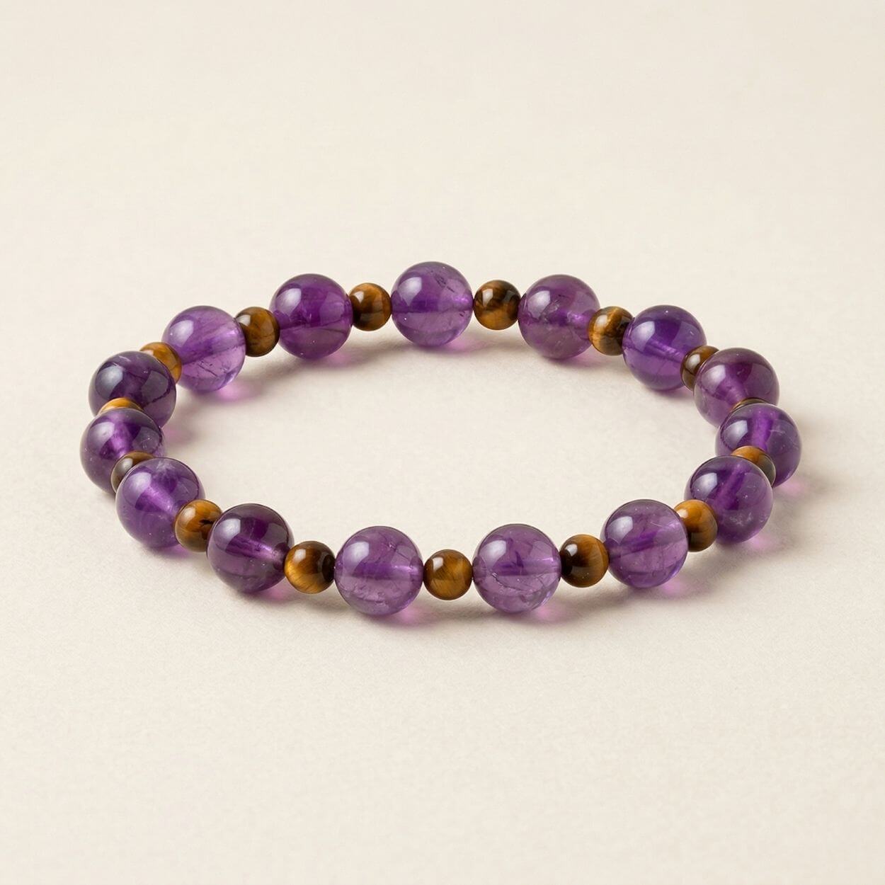 Bracelet “Evolution spirituelle” en améthyste et oeil de tigre