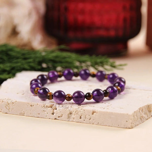 Bracelet “Evolution spirituelle” en améthyste et oeil de tigre